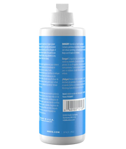 Andis 4oz clipper oil bottle showing the back label, used for lubricating hair clipper parts and maintaining their performance.