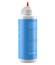 Andis 4oz clipper oil bottle with nozzle viewed from the side, used for maintaining and lubricating clipper parts.