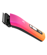 Andis ProClip 5-in-1 Sunset Clipper with detachable blade, showcasing ergonomic design and vibrant sunset color.